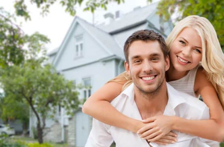 Happy Couple Buys a House