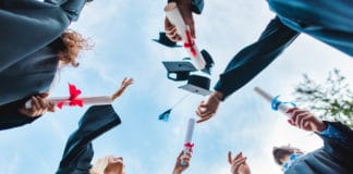 The Cost of Higher Education: How to Finance Graduate School college students celebrating